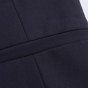 Close-up of high-quality dark blue twill fabric and premium stitching detail
