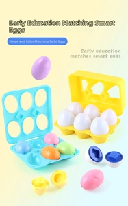 Detail of color and shape matching Easter eggs set in blue and yellow storage trays