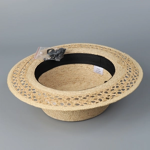 Flat top raffia sun hat with elegant hollow weave brim and adjustable inner band