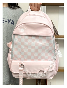 Pink nylon backpack with a transparent window layer and stylish acrylic chain detail