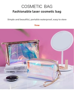 Detail of waterproof holographic laser makeup bag with golden metal zipper and portable strap