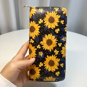 Long PU leather wallet featuring yellow sunflower prints and secure metal zipper