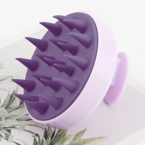 Detailed side view of purple silicone scalp massager brush with 19 flexible massage teeth
