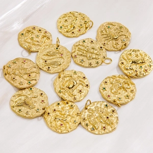 Set of 12 zodiac coin pendants in 14K gold plated stainless steel with colorful gems