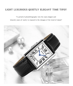 Elegant women's square quartz watch with Roman numerals and blue hands on marble background