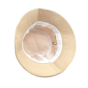 Unisex khaki cotton bucket hat featuring unique yellow banana embroidery inside the brim