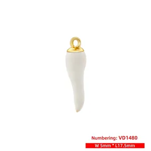 Macro detail of a white S-shaped pepper pendant with 5mm width and 17.5mm length