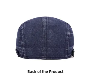 Rear view of vintage washed denim newsboy cap with metal adjustable buckle and stitching