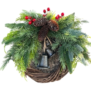 Bohemian Christmas wreath with pine needles, red berries, cones and rustic metal bells