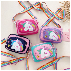 Top view of unicorn crossbody bags in four colors with rainbow adjustable straps