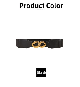 Detail of black elastic waist belt with a golden double ring buckle and leather ends