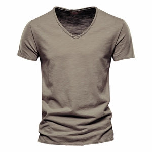 Close-up of V-neck neckline showing premium slub cotton texture on khaki t-shirt