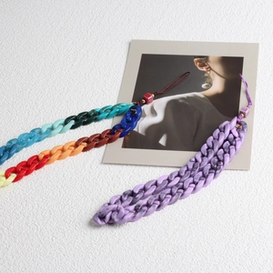 Detail view of Bohemian acrylic phone lanyards in gradient colors and marble patterns