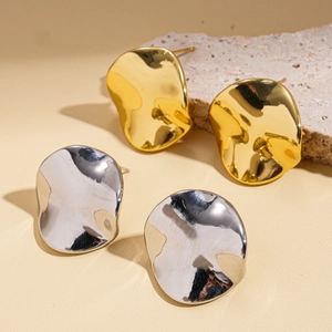 Irregular twisted round stud earrings in 14K gold plated and silver metal finishes