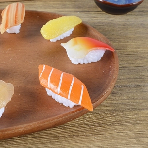 Realistic PVC salmon and tuna sushi models on a wooden tray for Japanese food display