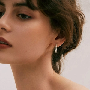 Elegantly designed gold S925 silver hoop earrings with shimmering micro-set zircon accents