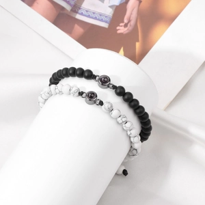 Couples woven stone bracelets with 100 languages projection stone in black and white marble