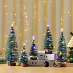 Mini pre-lit frosted cedar Christmas tree set with LED lights and a rustic wooden base