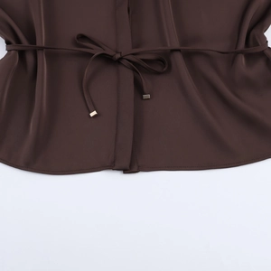Women's dark brown satin blouse with adjustable drawstring waist and gold metal aglets