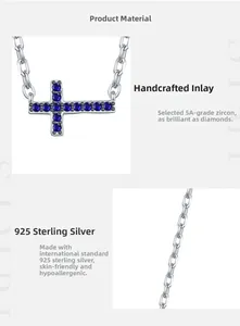 Detailed macro view of S925 sterling silver cross pendant with hand-set blue zircon