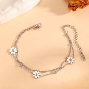 Double-layer stainless steel daisy bracelet with white enamel petals and zircons