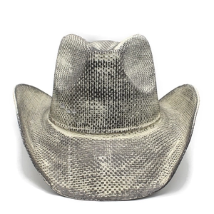 Detail of western cowboy hat featuring black and white snakeskin texture and wide brim