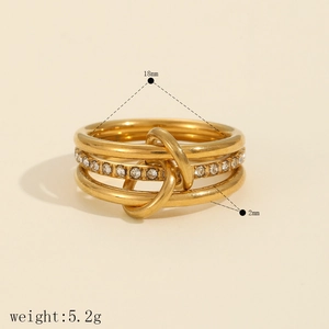 Detail view of gold multi-layer stainless steel ring with micro-pave diamond accents