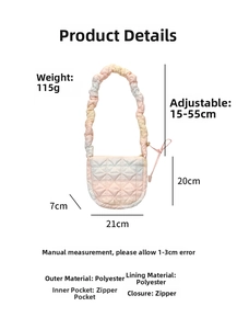 Detail of gradient cloud bag showing adjustable quilted strap and soft polyester fabric texture