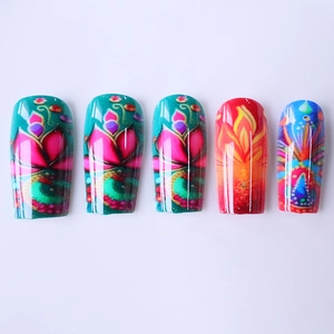 Vibrant color-block press-on nails with lotus, flame, and ethnic patterns in a 5-piece set