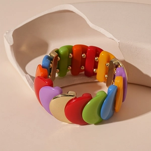 Colorful acrylic geometric beaded bracelet with heart shapes and gold accents