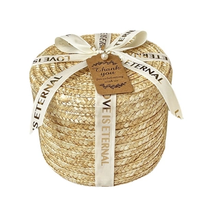 Handmade round straw gift box with lid and elegant cream ribbon for wedding packaging