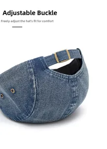 Close-up of adjustable metal buckle on washed blue denim baseball cap for custom fit