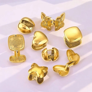 Golden titanium steel earring set featuring heart butterfly and geometric ball shapes
