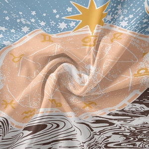 Detail of zodiac signs and celestial map pattern on bohemian wall tapestry fabric