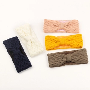 Winter fleece-lined knitted bow headbands in multiple colors like navy and pink