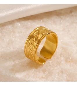 Macro shot of 18K gold plated stainless steel ring featuring detailed woven texture