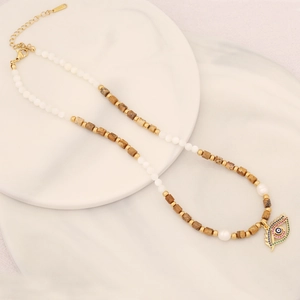 Elegante collana in pietra naturale con ciondolo malocchio e perle di conchiglia