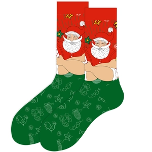 Detail of festive Christmas crew socks featuring Santa Claus and reindeer holiday patterns