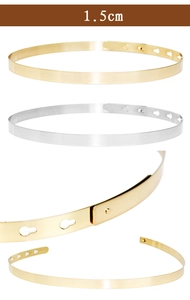 Detail showing 1.5cm wide gold and silver metal belts with adjustable buckle eyelets