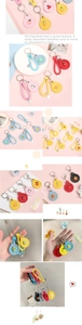 Detailed view of colorful fruit-themed leather keychains with diverse fruit patterns
