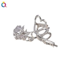 Elegant silver metal rose hair claw clip with a minimalist design for women