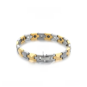 Detail of magnetic tungsten steel bracelet showing dual-tone links and embedded magnets