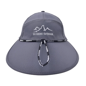 Close-up of outdoor sun hat with wide brim, breathable mesh and adjustable chin strap