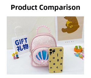Mini pink sequin backpack for girls with shell detail and pearl handle next to a phone