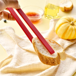 Red silicone food tongs for bread and steak with heat-resistant and non-slip design