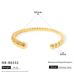Detailed view of golden stainless steel beaded open bangle with size and weight metrics