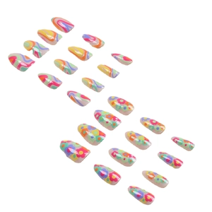 Rainbow press-on nails with colorful wave lines and floral patterns on white background