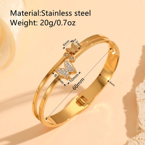 Double-layer gold stainless steel butterfly bangle with clear zircons and 60mm inner diameter