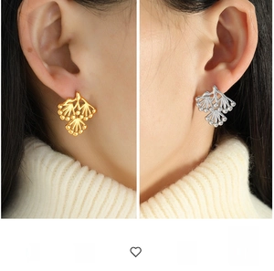 Exaggerated pine branch design stud earrings in polished gold and silver finish
