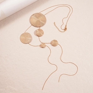 Minimalist gold-tone layered necklace with textured circular ripple charms for women